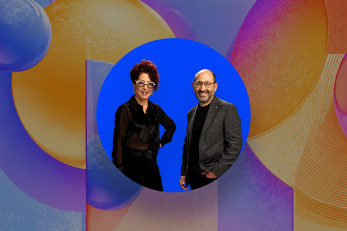 Amy Gómez and Brian Kaiser standing side by side