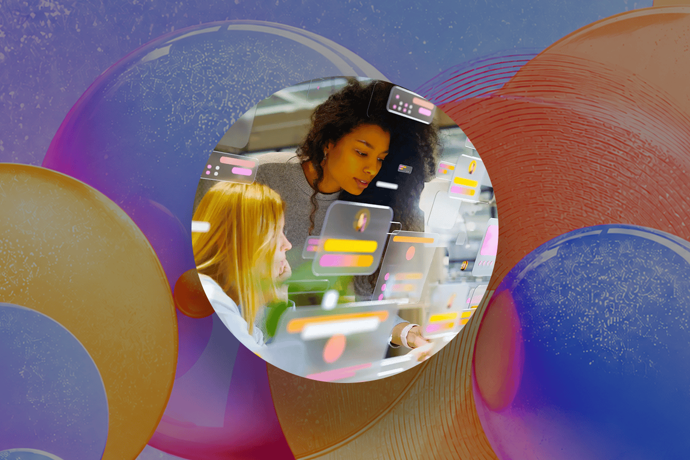 Two colleagues looking at floating interface panels on a screen