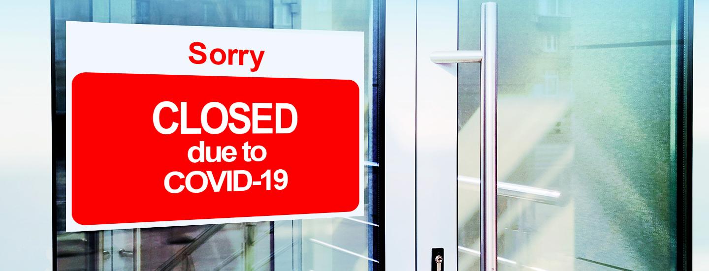Sign reading 'Sorry, closed due to COVID-19'